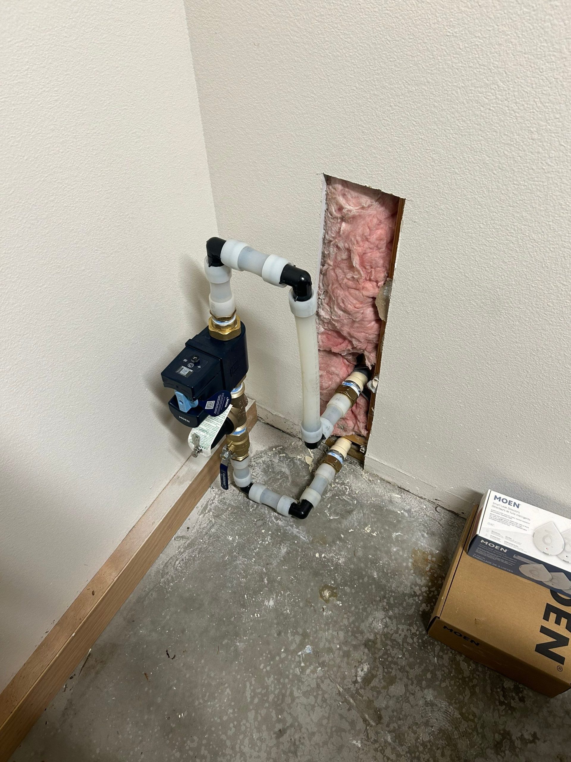 Flo by Moen whole-home leak detection system installed at main water shutoff